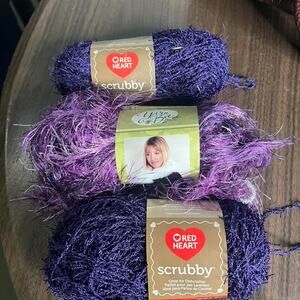 Bundle of red heart scrubby yarn
